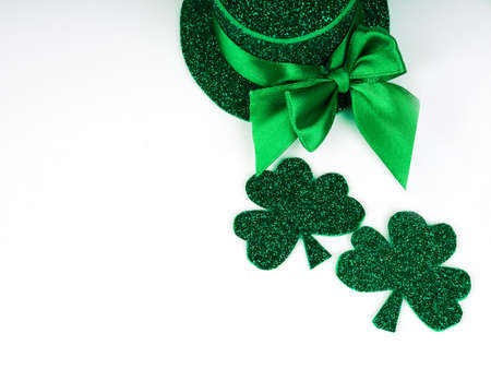 green clovers or shamrocks, Green hat isolated on white background. St. Patricks Day Holiday concept. Spring background.の写真素材