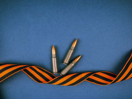 Victory Day Still Life, St. George's ribbon on a blue background, postcard, place for text, victory day may 9.の写真素材