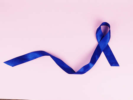 Symbol for support men. Blue ribbon on pink background. Healthcare, International men, Father and World cancer day conceptの写真素材