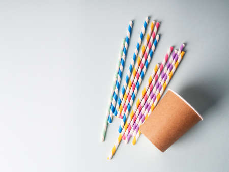 Several colorful cocktail tubes in a glass.の写真素材