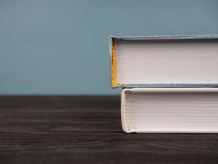 a stack of several books, close-up.の写真素材