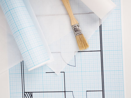 architectural drawings for the layout of the apartment design, millimeter paper, tracing paper in a roll and pencils.の写真素材