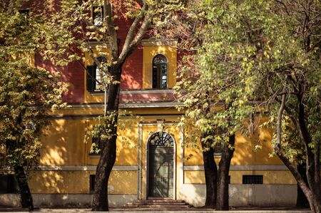 Cityscape Tirana Ministerial Buildings in Autumn. Light between shadows on old historical facade.のeditorial素材