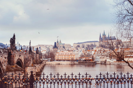 Scenic view to Lesser Town (Mala Strana), Prague castle and Charles Bridge from the other side of Vltava river.のeditorial素材