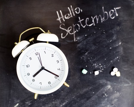 Close up vintage clock on blur background.の写真素材