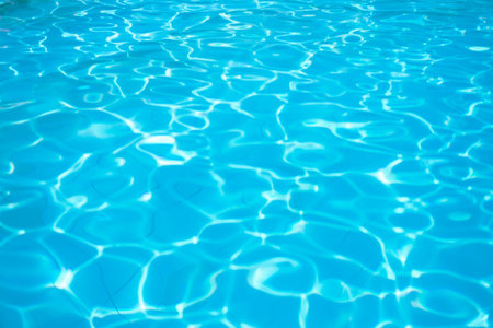surface of blue swimming pool, abstract background of water in swimming pool.
