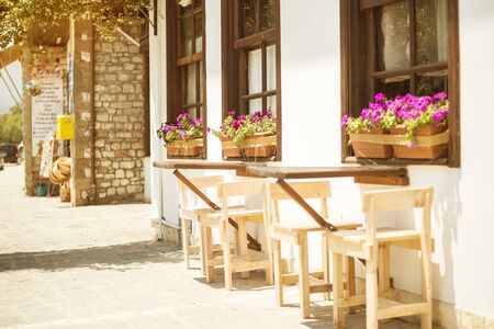 BERAT, ALBANIA - June 2018: Cozy street cafe in Historical town Berat, Albania, Unesco World Heritage Siteのeditorial素材