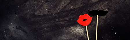 Photo booth props mustache, crown, lips on black board background. Birthday and Party Set and wedding.の写真素材