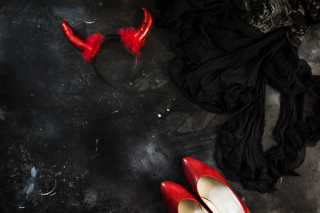 Halloween party female outfit accessories. Flat lay, top view, copy space, squareの写真素材