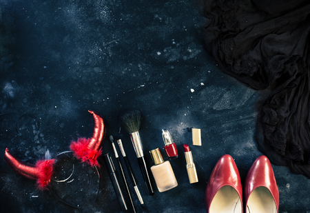 Halloween party female outfit accessories. Flat lay, top view, copy space, squareの写真素材