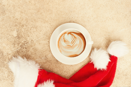 Vintage mood, Cappuccino on top with heart latte art lay on marble tableの写真素材