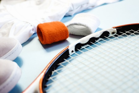 Sport and fitness healthy lifestyle slat lay with tennis racket and athletic wear.の写真素材