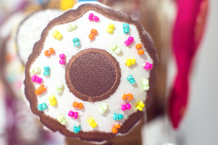 Colorful donuts keychain for sale details macro closeupの写真素材