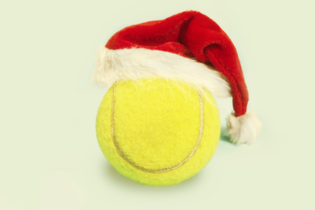 santa hat on tennis ball Christmas greetingの写真素材