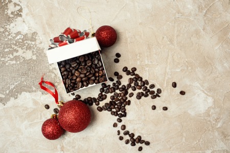 Christmas gift box full of roasted coffee beans top viewの写真素材