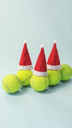 santa hat on tennis ball Christmas greetingの写真素材
