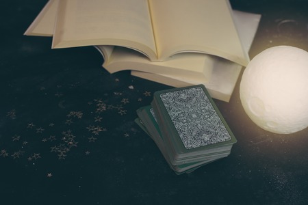 Tarot cards on fortune teller desk table. Future reading.の写真素材