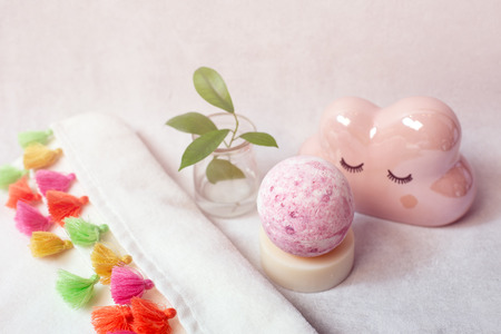 Spa bath cosmetic. Soap beauty treatment background. Aromatherapy with natural salt and bath bomb.の写真素材