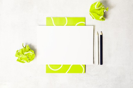 Blank white sheet with tennis ball template background top viewの写真素材