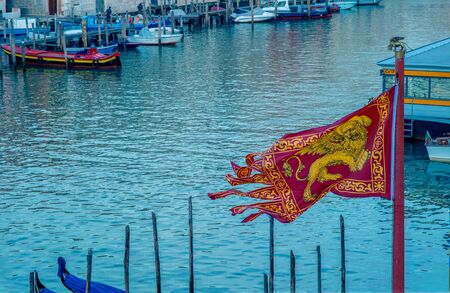 flag of Venice, main symbol of Venice - the golden winged lion of Evangelist Markのeditorial素材