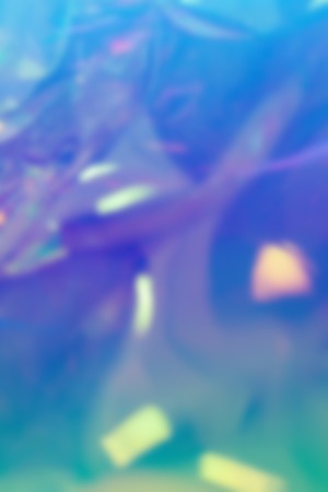 Blurry abstract iridescent holographic foil backgroundの写真素材