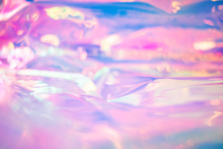 Blurry abstract iridescent holographic foil backgroundの写真素材