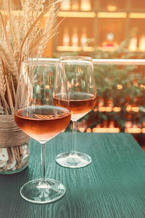 Wine glasses in a restaurant setting.の写真素材