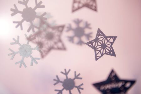 Merry Christmas card with falling stars and snow flakesの写真素材