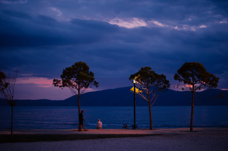 Vlora, Albania. July 2019: the main walking pedestrian zone Lungomare in the evening.