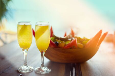 Refreshing orange Mimosa cocktails with champaigneの写真素材