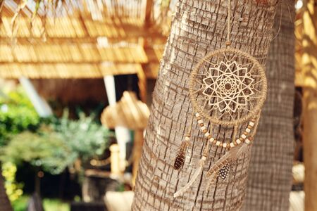 Dream catcher blown around by a light sea breezeの写真素材