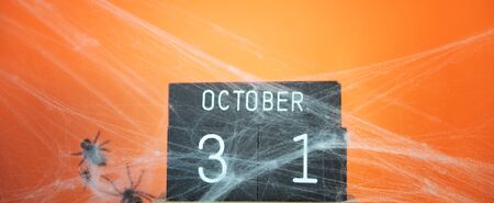 The concept for Halloween. wooden calendar showing October 31の写真素材