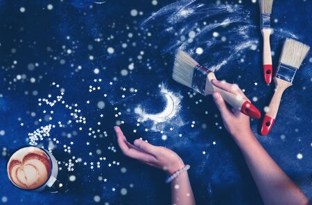 Night sky and moon: composition made of flour and candy stars on dark blue background.の写真素材