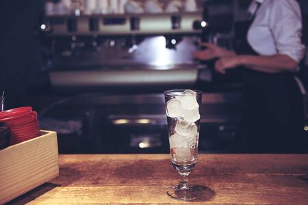 Barista and coffee machines, vintage filter appliedの写真素材