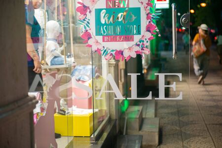 store showcase window display with text sale.のeditorial素材
