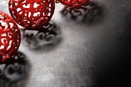 christmas background red ornament black background copy spaceの写真素材