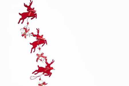 Christmas composition. Christmas gift, pine cones, fir tree branches on white background. Top view, flat lay, copy space.の写真素材