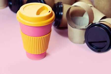 Zero waste concept Stylish reusable eco coffee cup vs multiple single use cardboard cups. Ban single use plastic.の写真素材