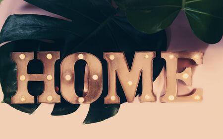 Idea of interior decoration with metal illuminated letters making home wordの写真素材