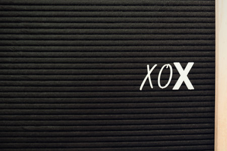 Letter board with xox writingの写真素材