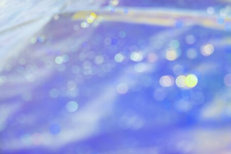 Iridescent holographic rainbow crystal abstract texture background trendy colorsの写真素材