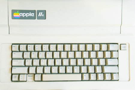 Vintage tone close-up Apple II logo on vintage keyboard Apple Computer, Inc
