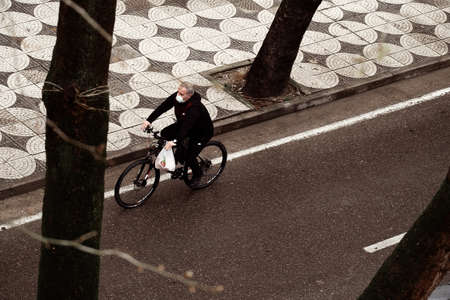 person in face mask during lockdown to prevent spreading COVID-19のeditorial素材