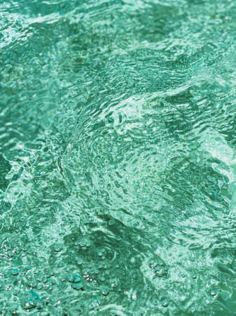 top view ripples on water emerald greenの写真素材