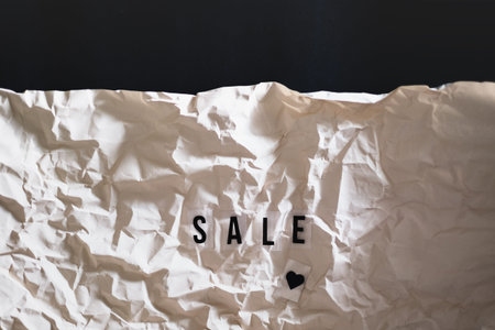 letters text sale on wrapped paper