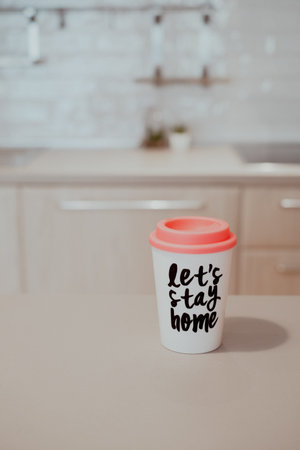 Reusable coffee mug to go in a kitchen