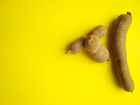 Exotic tamarind, delicious ripe tamarind fruit, close up, fruit harvestの写真素材