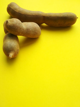 Exotic tamarind, delicious ripe tamarind fruit, close up, fruit harvestの写真素材