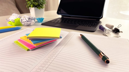 A stylish workspace with a laptop, bright sticky notes, and a planner. Perfect for learning topics,...