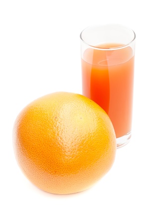 grapefruit with glass of grapefruit juiceの写真素材